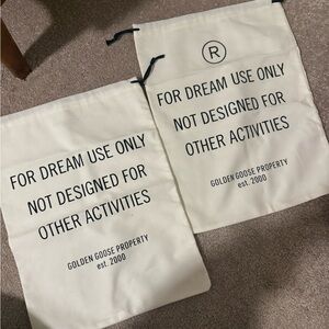 Golden Goose Cream Drawstring Duster Bags